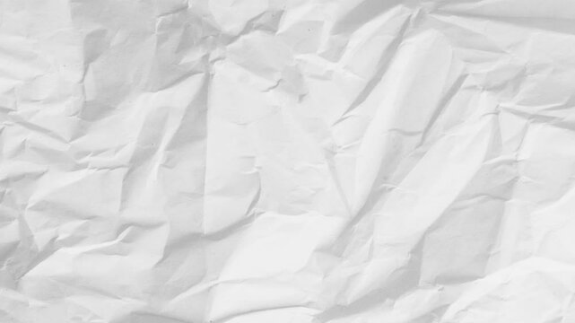 Detailed close up of crinkled white paper surface and textured background