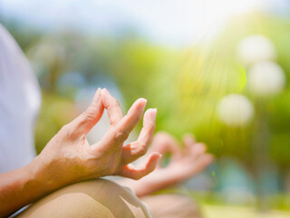 Closeup hand yoga poses lotus meditation mental health care, fitness activity people exercise wellness zen motivation mindfulness and healthy. Healthy lifestyle elderly care yoga workout. Senior woman