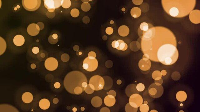 Animated golden bokeh lights abstract background for festive and elegant visuals