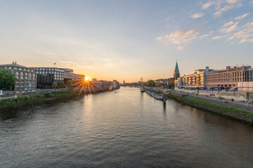 Bremen skyline at sunset with view of Weser River, Germany