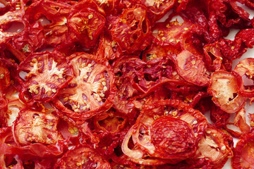 drying tomatoes in the sun, finely chopped tomatoes are dried on the balcony,
