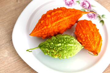 ripe and yellowed Momordica charantia (Mother melon) seeds of Momordica charantia, a medicinal fruit,