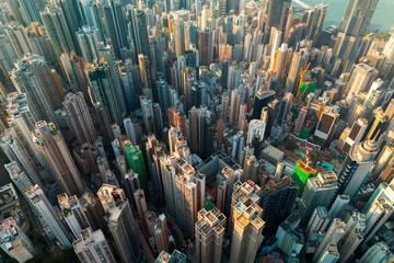 A top-down perspective over Hong Kong reveals the incredible density of its high-rise buildings....