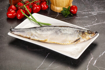 Whole raw salted herring fish