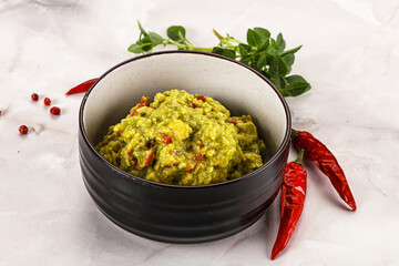 Guacamole with avocado, tomato and chili