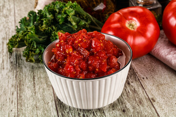 Diced ripe tomato with sauce
