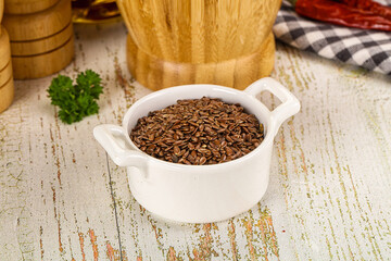 Brown flax seeds in the bowl