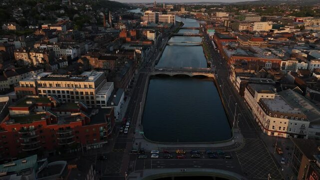 Captivating city view of Cork, Ireland bathed in golden hour light