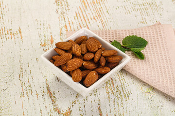 Tasty ripe almond nuts heap