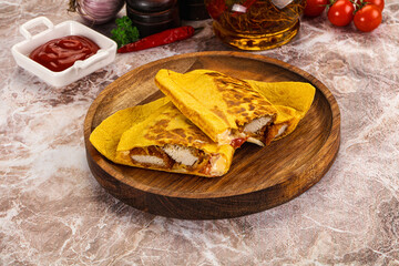 Spicy quesadillas with chicken fillet