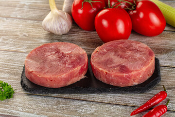Raw round tuna fish fillet