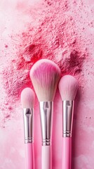 Pink makeup brushes arranged neatly over a vibrant pink powder background showcasing beauty tools for makeup application