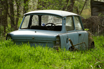  "Forgotten Trabant: Abandoned & Overgrown Car in Hungarian Field"