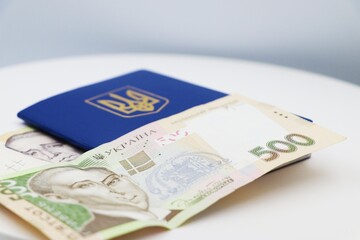 Ukrainian money and passport. Economics and citizenship.