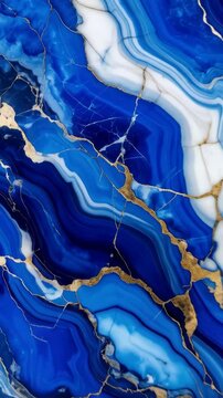 Abstract background featuring swirling blue and white agate patterns with glittering golden veins and fractured lines for textures