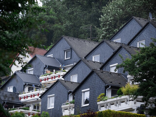 Modern Row Houses with Slate Facades on a Hillside in Germany