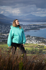 Woman Posing at Coastal town Viewpoint