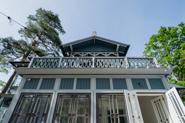 Renovated luxurious traditional wooden building exterior in Jurmala city in Latvia