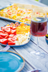 Strawberry Soda and cheese pizza on the table. Soft focus. High quality photo