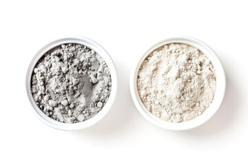 Two small bowls containing gray and white powder on a white isolated background.
