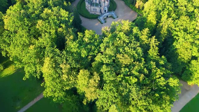 Explore the serene surroundings of the Schwarzenberg tomb in Domanin, near Trebon, Czechia. Discover the lush greenery and peaceful atmosphere in this historic burial site.
