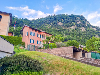 Fototapeta premium Caslano- Switzerland- 2 May 2025: View of traditional houses in the Ticino.