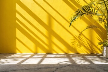 Panoramic abstract yellow background for product presentation with sunlight and blurred shadows wall. 