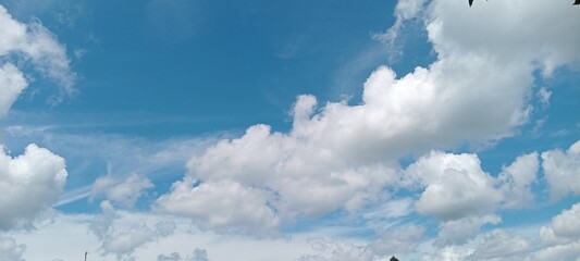beautiful sky background with clouds in blue sky. Sunlight and Clouds