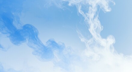 Obraz premium Swirling blue and white smoke against a light blue gradient background, creating an ethereal effect with soft, flowing shapes. Emphasizes tranquility and movement.