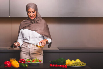 Arab Wife Cooking In Kitchen, Making Fresh Vegetable Salad With Olive Oil Dressing Standing At...