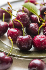 Fresh cherries fruits in a plate, macro photography, summer fruits. Abstract fruit food photo