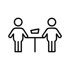 Two people exchanging ideas while standing at a table