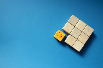 One Wooden Block Breaking Away from the Group