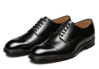 Pair of black leather oxford shoes isolated on white background