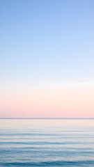 Obraz premium Ocean horizon with gradient pastel sky, minimalist seascape, calm and empty composition.