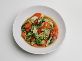 Stir fries vegetables on white plate
