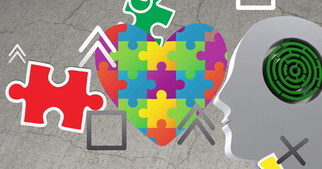 Heart of puzzle pieces resting on cracked concrete, with red puzzle piece and maze head silhouette
