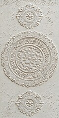 Monochrome Embossed Floral Circles Pattern with Textured Detail Aesthetic