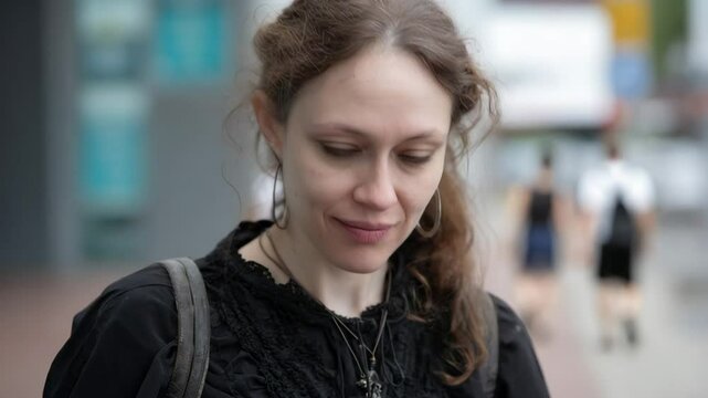 Woman on a street with a creepy smirk face