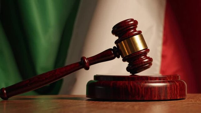 A golden Jatob&aacute; gavel rests elegantly on a sound block with Italy&rsquo;s flag flowing in the background, lit by warm tropical light to represent justice and culture