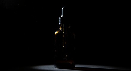 Bottle with Dropper on Dark Background Liquid Container