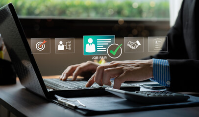 Businessman searching job fair information online using laptop with virtual recruitment icons, concept of online career opportunity, candidate selection, HR technology, hiring process, job application