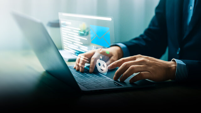 Businessman using laptop with AI-powered email writing assistant, illustrating artificial intelligence automation for smart communication, productivity, and efficient message generation