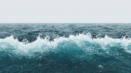 Fototapeta premium Ocean waves crashing on the shoreline.