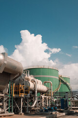 Demineralized water tank and multi effect desalination plant (MED) at industrial power plant. A...