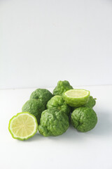Fototapeta premium Bergamot fruits or kaffir lime fruit isolated on white background