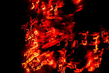 Abstract blaze fire flame texture for banner background. Burning fire concept. Fire flames on black...