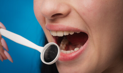 Dental clinic. Close up teeth with dental mirror. Ideal white teeth. Dental treatment. Teeth...