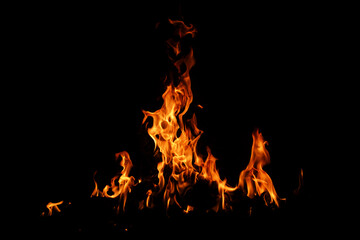 Fire flame background. Hell bonfire. Texture of fire on a black background. Abstract fire flame...