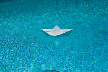 Travel vacation holiday. Concept of tourism. Traveling and sailing adventure. Origami ship paper...